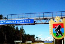 «Власть в Карелии легко может сделать преступником любого» Дорожный указатель на административной границе Карелии. Фото: vk.com