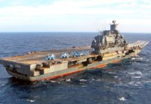Россия вышла на третье место в мире по объему военных расходов Тяжелый авианесущий крейсер "Адмирал Кузнецов". Фото: warfiles.ru
